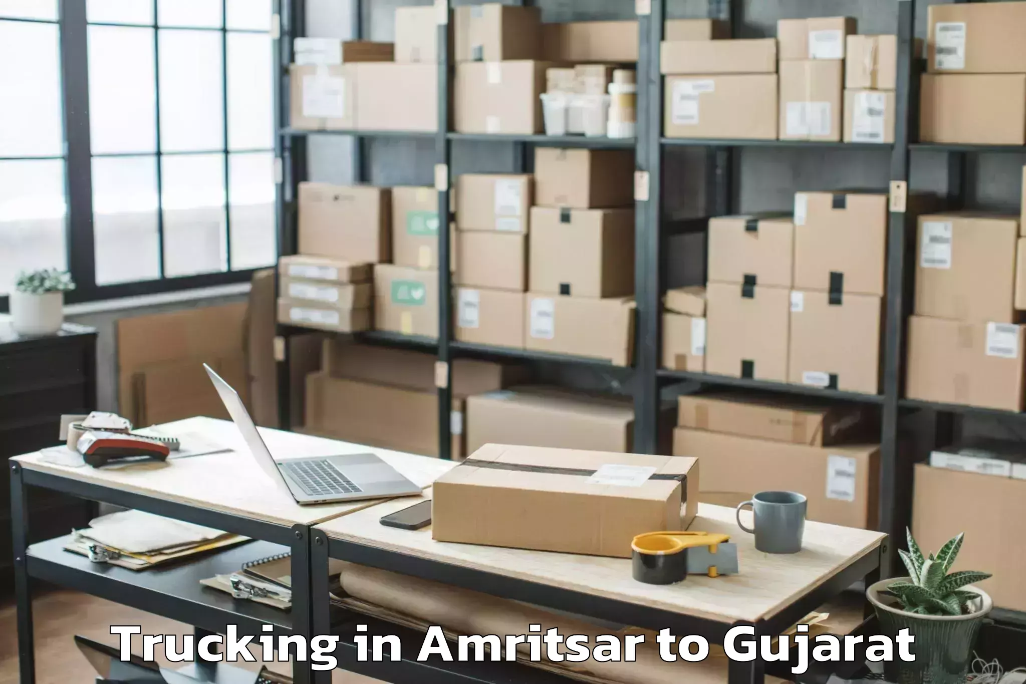 Book Amritsar to Gujarat University Of Transpla Trucking